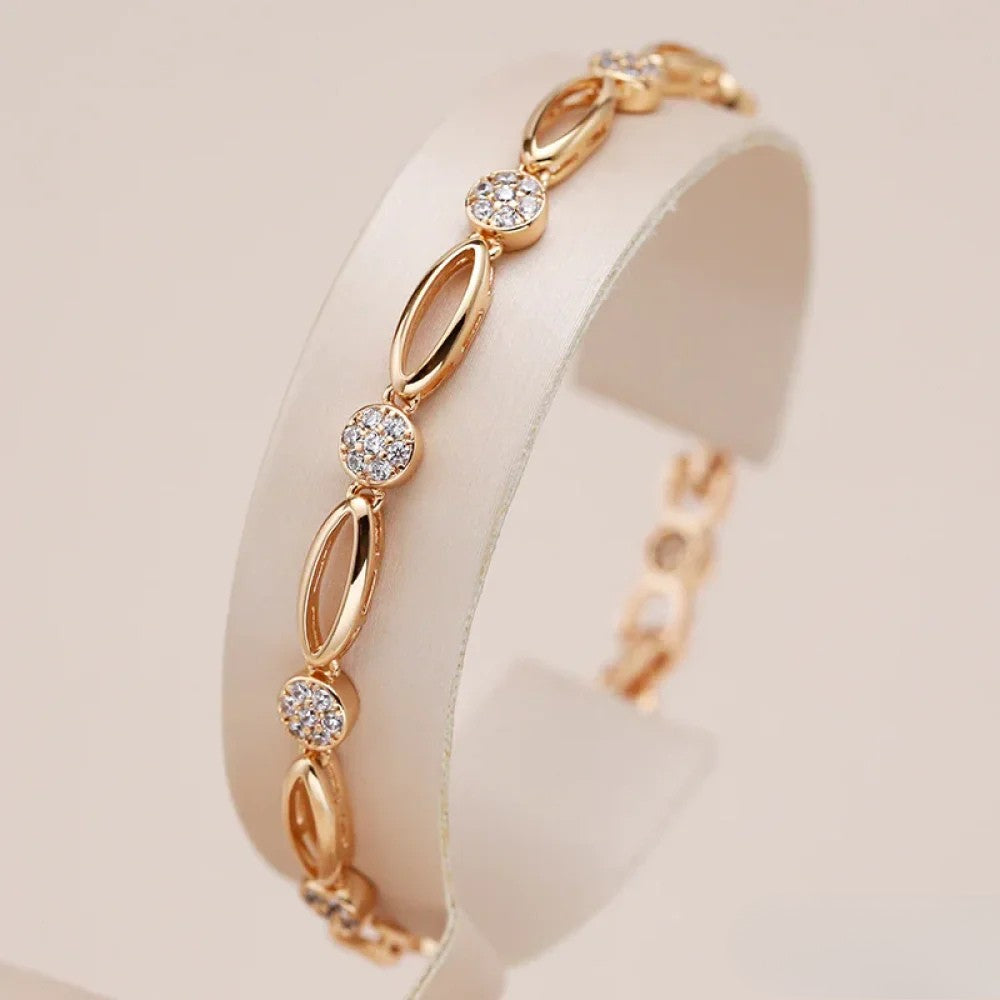 Elegant armbånd med gylden zirkonia
