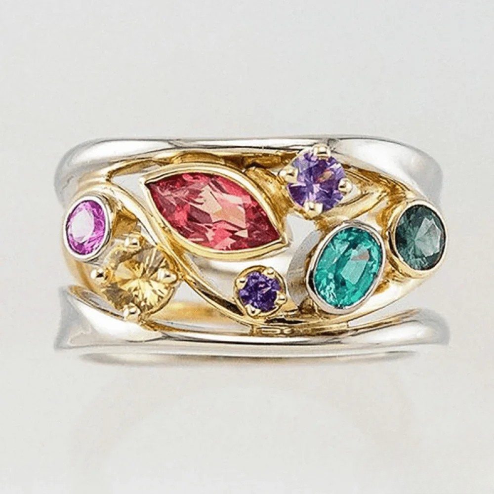 Vintage-ring med guldfarvede og sølvfarvede zirkonia.